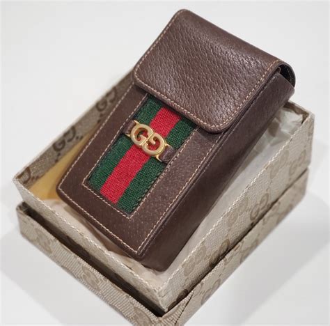 gucci cigarette case fake|counterfeit gucci bag.